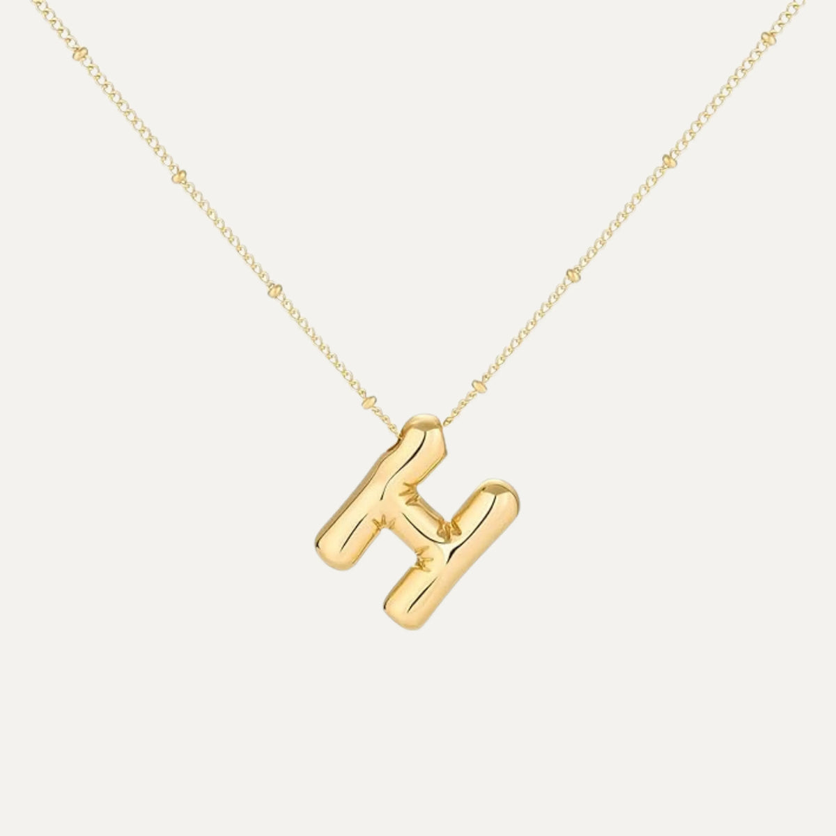 Bubble initial necklace - top view