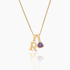 Collar inicial con charm de piedra de aniversario en baño de oro 18K